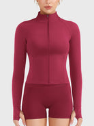 Candecy Full Zip Workout Jacket in ruby red, front view fully zipped, high neck design, sleek and supportive activewear fit