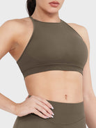 Acuffny High Neck Backless Sports Bra in coffee, angled front upper body view, sculpted bust shape, smooth and supportive fit