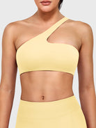 Claranie One Shoulder Sports Bra in milk yellow, front view upper body, asymmetric one shoulder neckline, smooth fitted silhouette