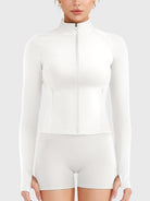 Candecy Full Zip Workout Jacket in white, front view fully zipped, high neck coverage, streamlined and polished fit