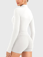 Candecy Full Zip Workout Jacket in white, angled back view, minimal and smooth back design, body-hugging fit