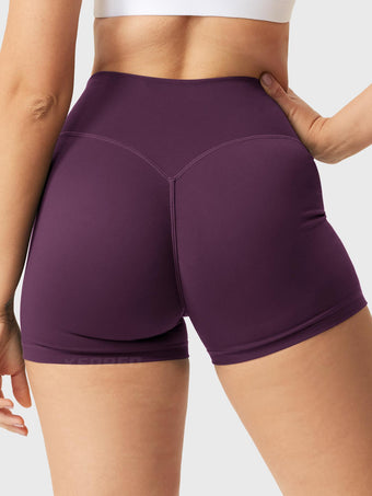 Back view of Yeoreo Elysina 2.5" Running Shorts in Black Cherry highlighting scrunch design