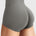 Side-back view close-up of Yeoreo Elysina 2.5" Running Shorts in Dark Grey showing hidden scrunch butt and high rise