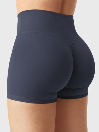 Side-back view of Yeoreo Elysina 2.5" Running Shorts in Grey Blue with model in different pose showing glute contour