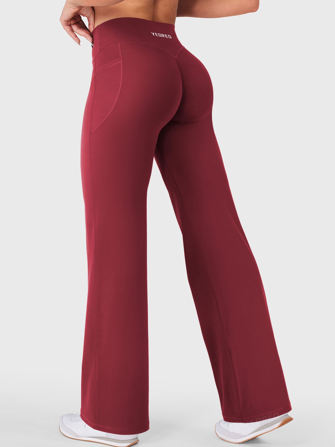 Anchor red athleisure straight leg leggings in walking motion, versatile all day wear