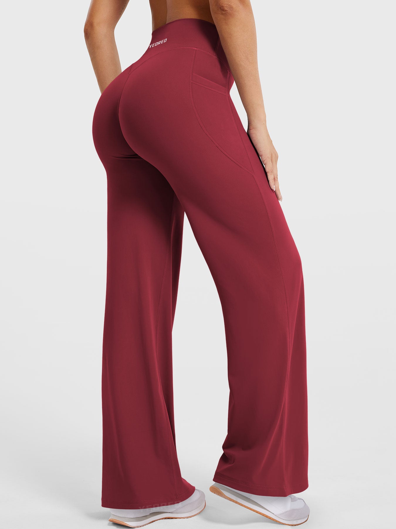 Anchor red straight leg leggings back angled view highlighting naturally flattering shape