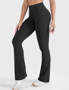 Black buttery soft mini flare workout leggings, angled front view