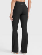 Black hidden-scrunch bootcut leggings, clean back view