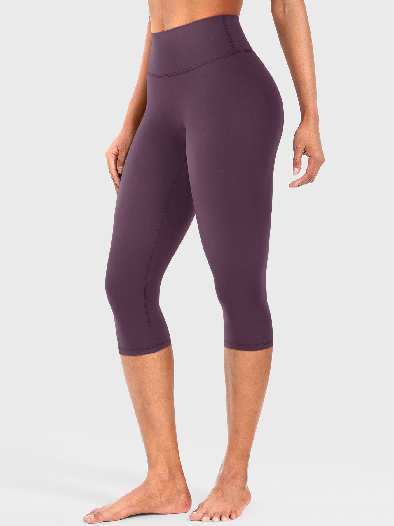 Black Berry Yeoreo Nailly Capri Leggings angled front view, high-waisted fit with no front seam design