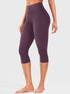 Black Berry Yeoreo Nailly Capri Leggings angled front view, high-waisted fit with no front seam design