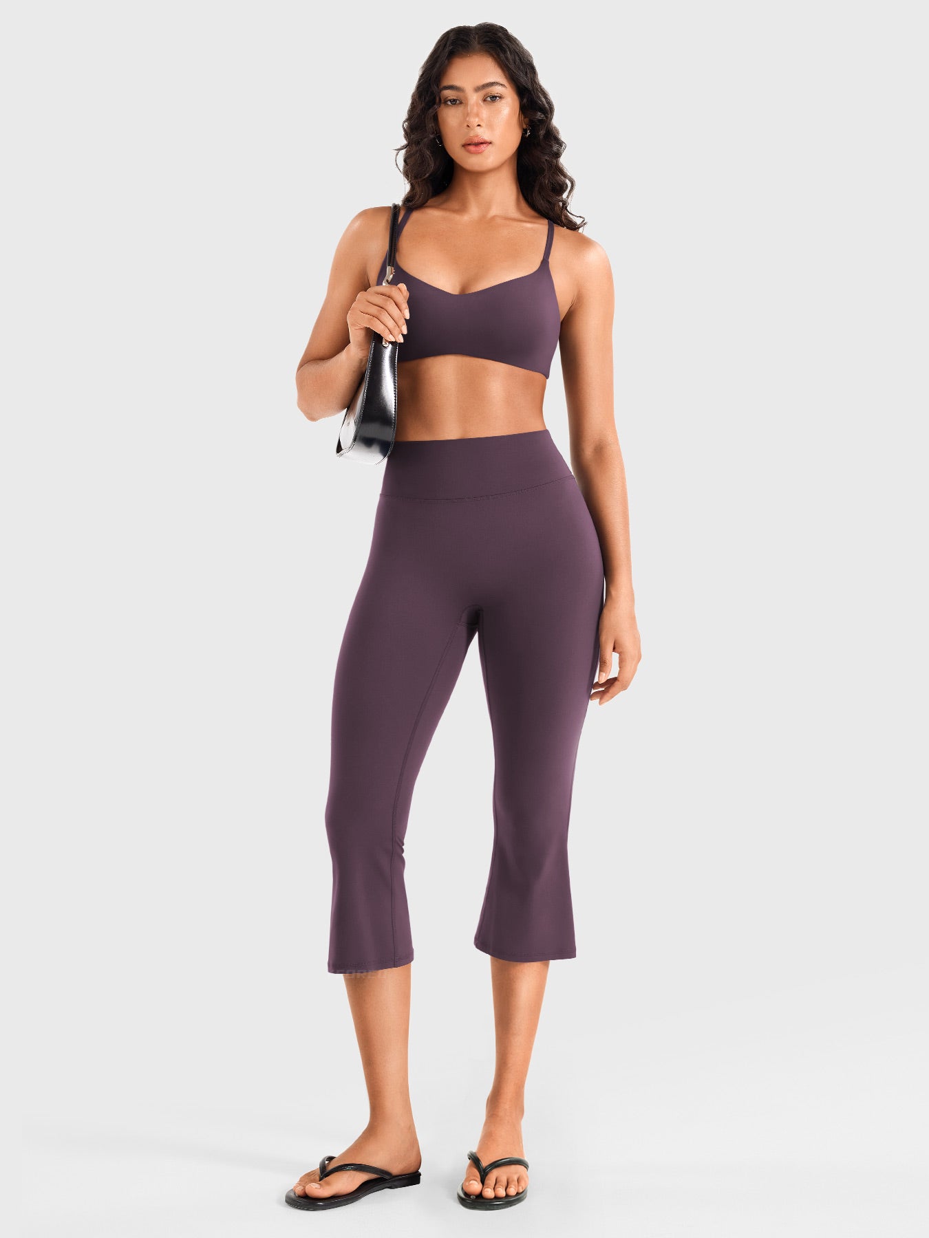 Black berry Yeoreo Daiane flared capri leggings full body outfit view, versatile yoga and everyday activewear styling