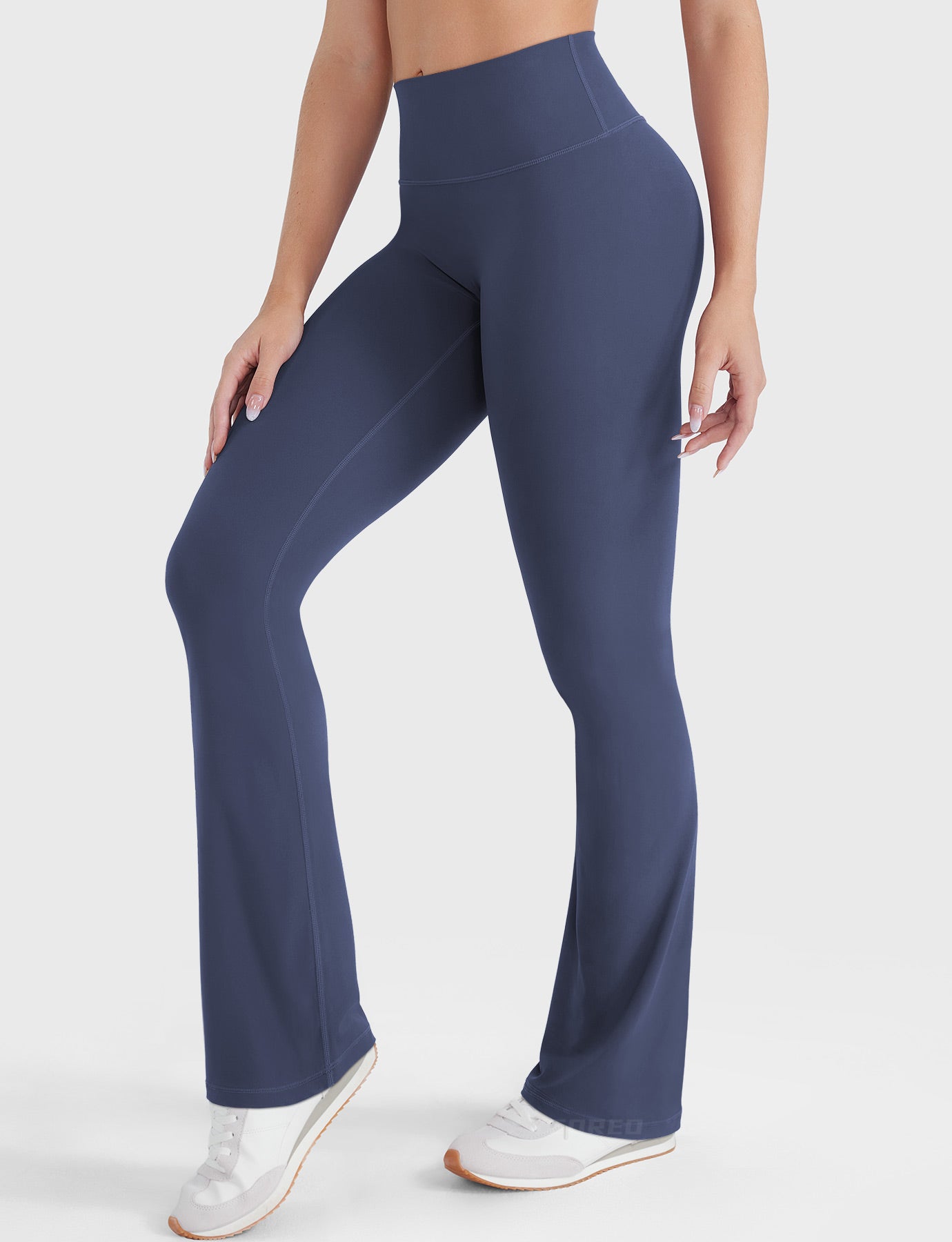 Navy buttery soft mini flare yoga leggings, angled front view