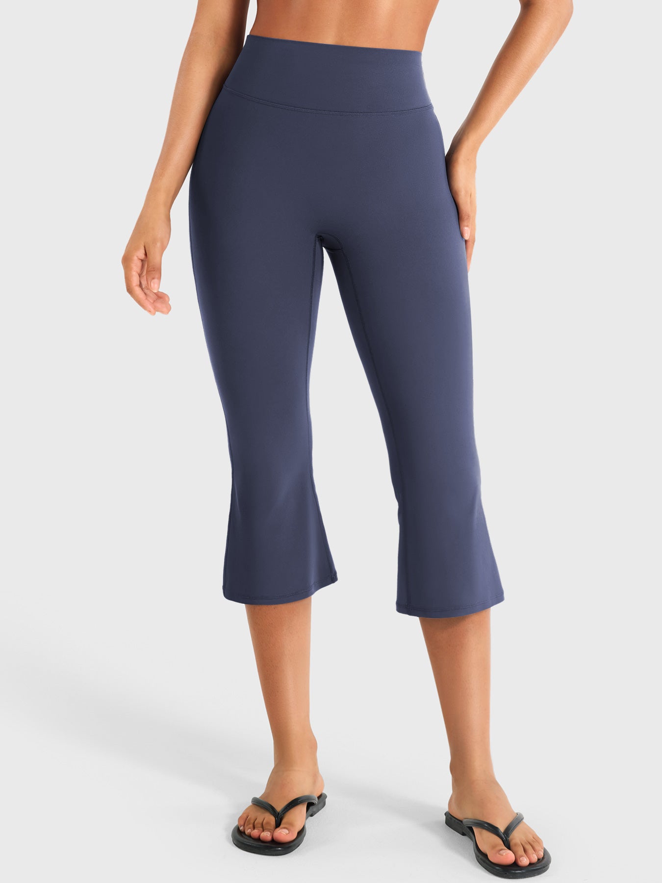 Navy Yeoreo Daiane high waisted flared capri leggings front view, 21 inch cropped flare design with sculpting fit
