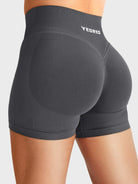 Dark Grey Baderiy 4.5" V-waistband seamless shorts angled back view, natural glute contour with subtle lift