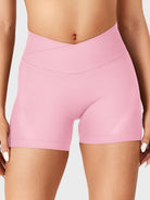 Pink Baderiy 4.5" V-cross waistband seamless shorts front view, no front seam with a high-waisted hourglass fit