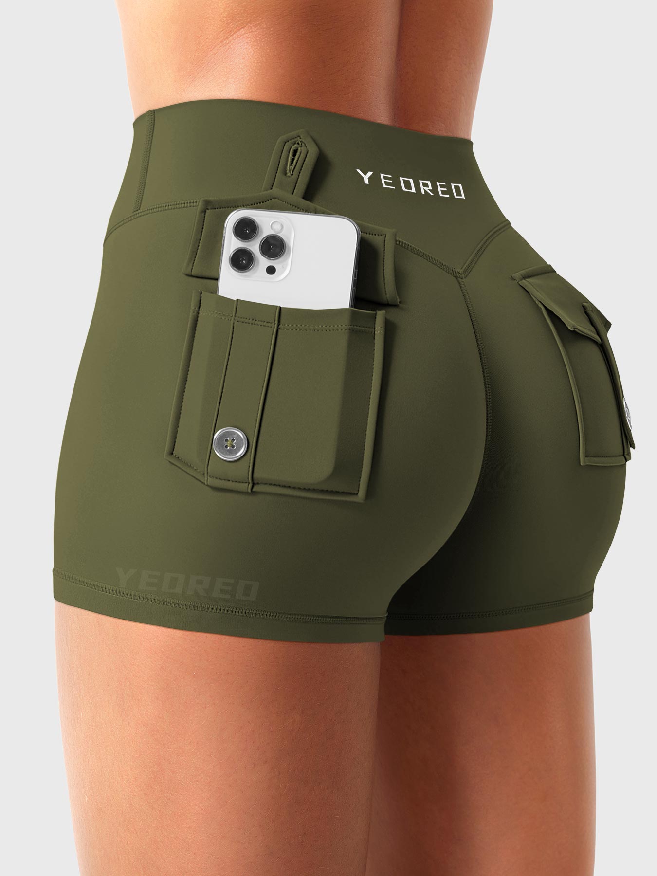 Army Green Yeoreo Darilya CoreFlex low rise cargo shorts angled back view, functional dual cargo pockets for essentials