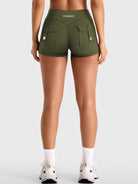 Army Green Yeoreo Darilya CoreFlex cargo shorts back view, V-back contour with dual cargo pocket design