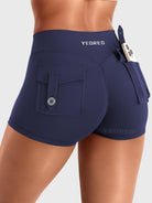 Navy Yeoreo Darilya CoreFlex Y2K cargo shorts angled back view, flap cargo pockets with utility-inspired details