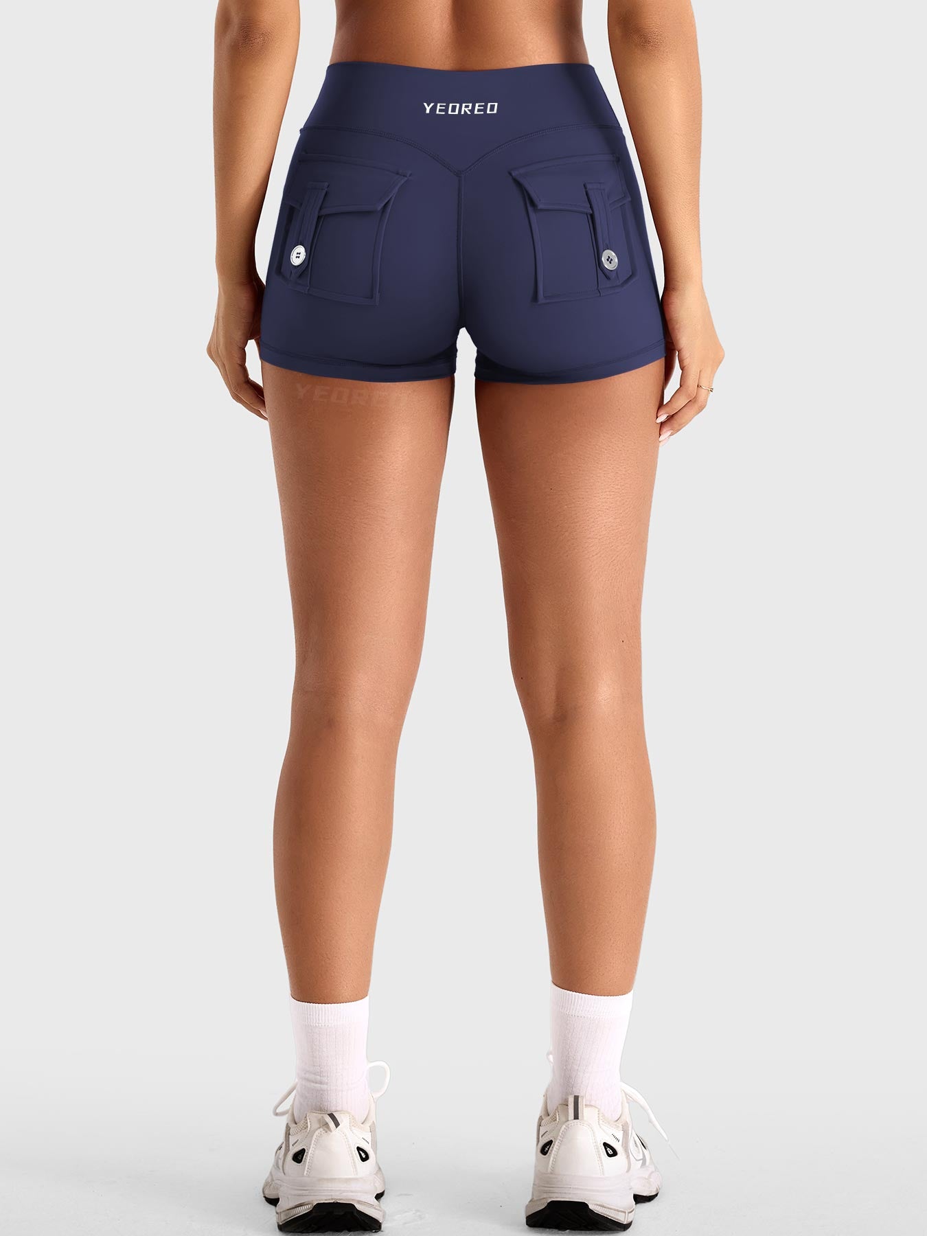 Navy Yeoreo Darilya CoreFlex cargo shorts back view, dual cargo pockets with sculpting V-back silhouette