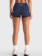 Navy Yeoreo Darilya CoreFlex cargo shorts back view, dual cargo pockets with sculpting V-back silhouette