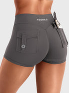 Dark Grey Yeoreo Darilya CoreFlex Y2K cargo shorts angled back view, flap cargo pockets with utility-inspired style
