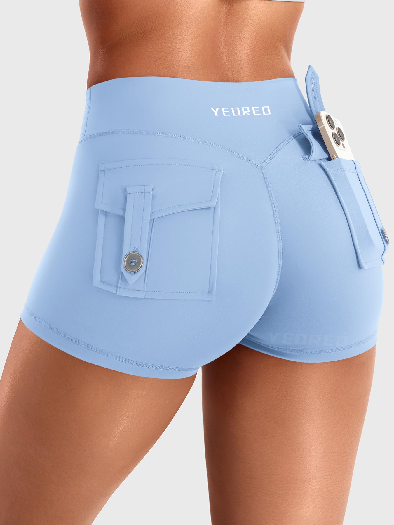Light Blue Yeoreo Darilyya CoreFlex Y2K cargo shorts angled back view, flap pocket detail and utility-inspired silhouette