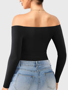 Dacrly Off Shoulder Bodysuit in black, back view layered with jeans, slim fit silhouette, street-ready styling